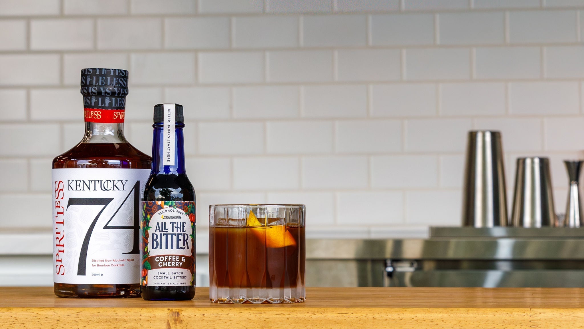 Photograph of a non-alcoholic coffee old fashioned mocktail made with Kentucky 74 and All The Bitter nonalcoholic coffee bitters.