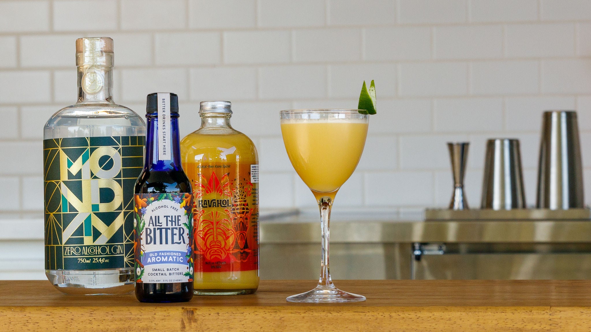 Picture of a non-alcoholic gimlet mocktail made with Monday Gin, Kavahol, and All The Bitter.