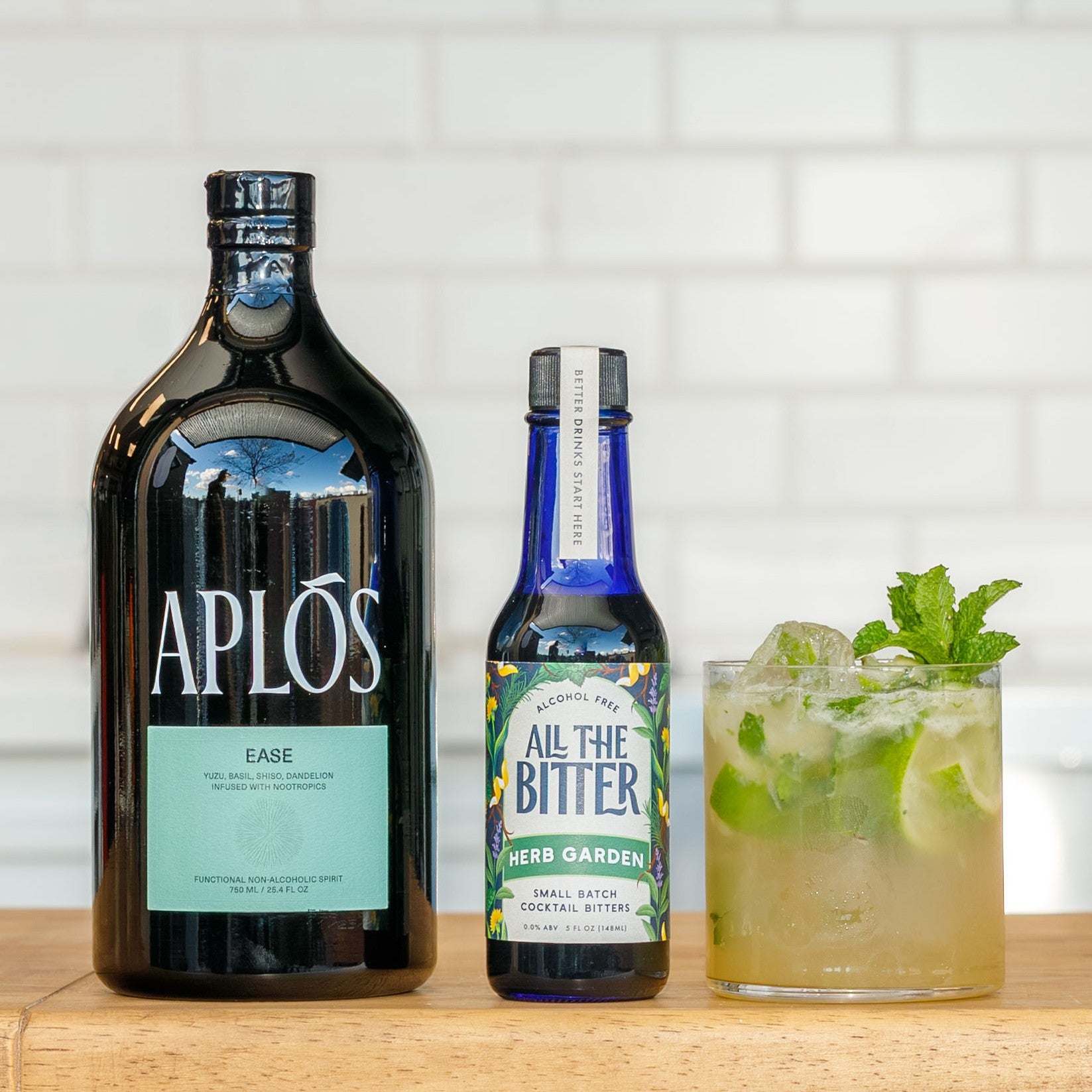 Nonalcoholic cocktail made with Aplos Ease, mint, lime, and herbal bitters.