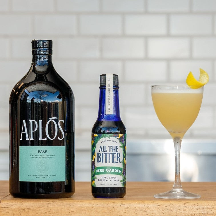 Nonalcoholic sour mocktail featuring Aplos Ease and All The Bitter Herb Garden bitters.